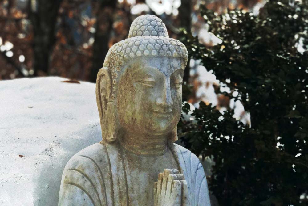 Buddha im Schnee